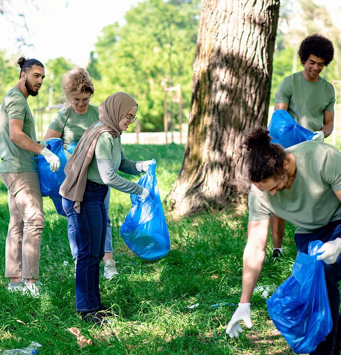 Diverse team carrying out community grounds maintenance